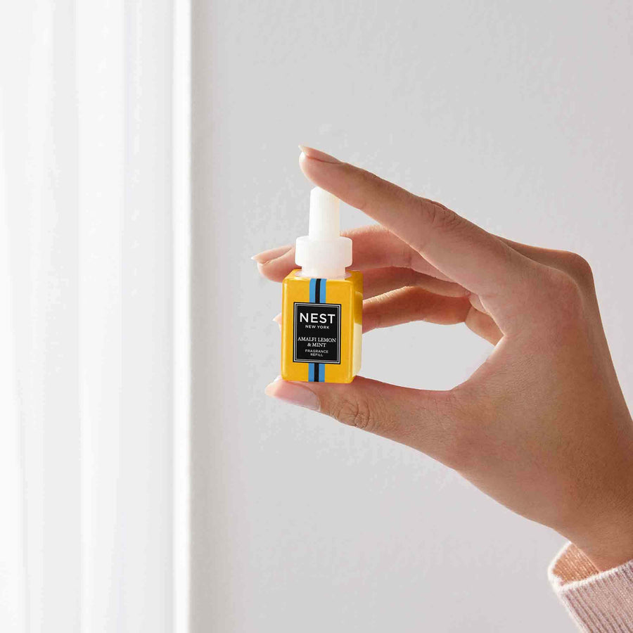 Amalfi Lemon & Mint Refill for Pura Smart Home Fragrance Diffuser by NEST New York with hand model
