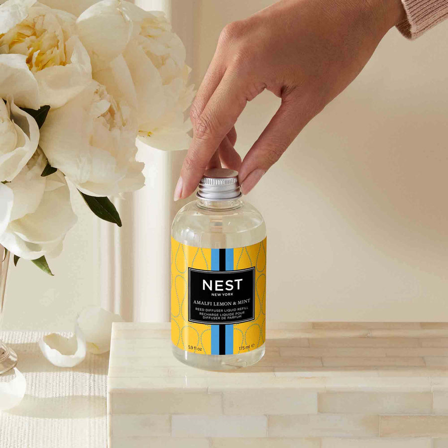 Amalfi Lemon & Mint Reed Diffuser Liquid Refill by NEST New York with hand model