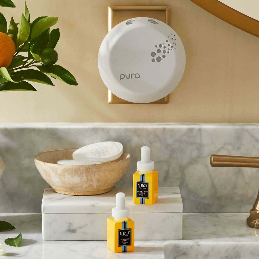 Amalfi Lemon & Mint Refill Duo for Pura Smart Home Fragrance Diffuser by NEST New York with cotton rounds, plant, and Pura