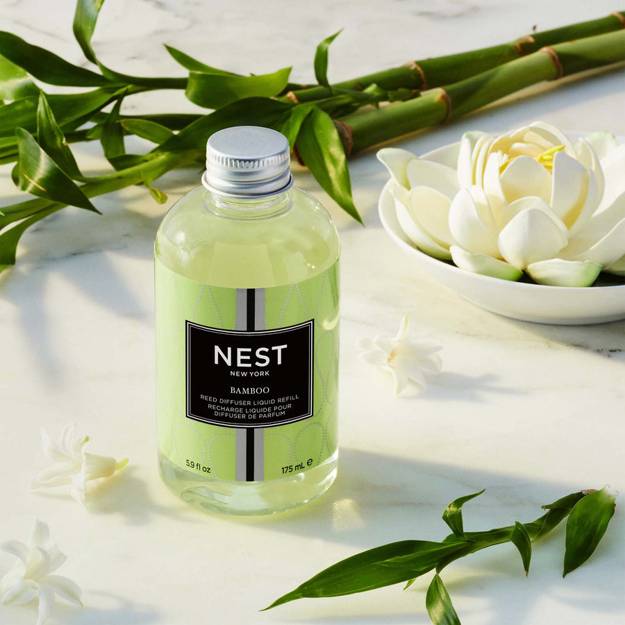 Bamboo Reed Diffuser Liquid Refill by NEST New York with flowers and bamboo