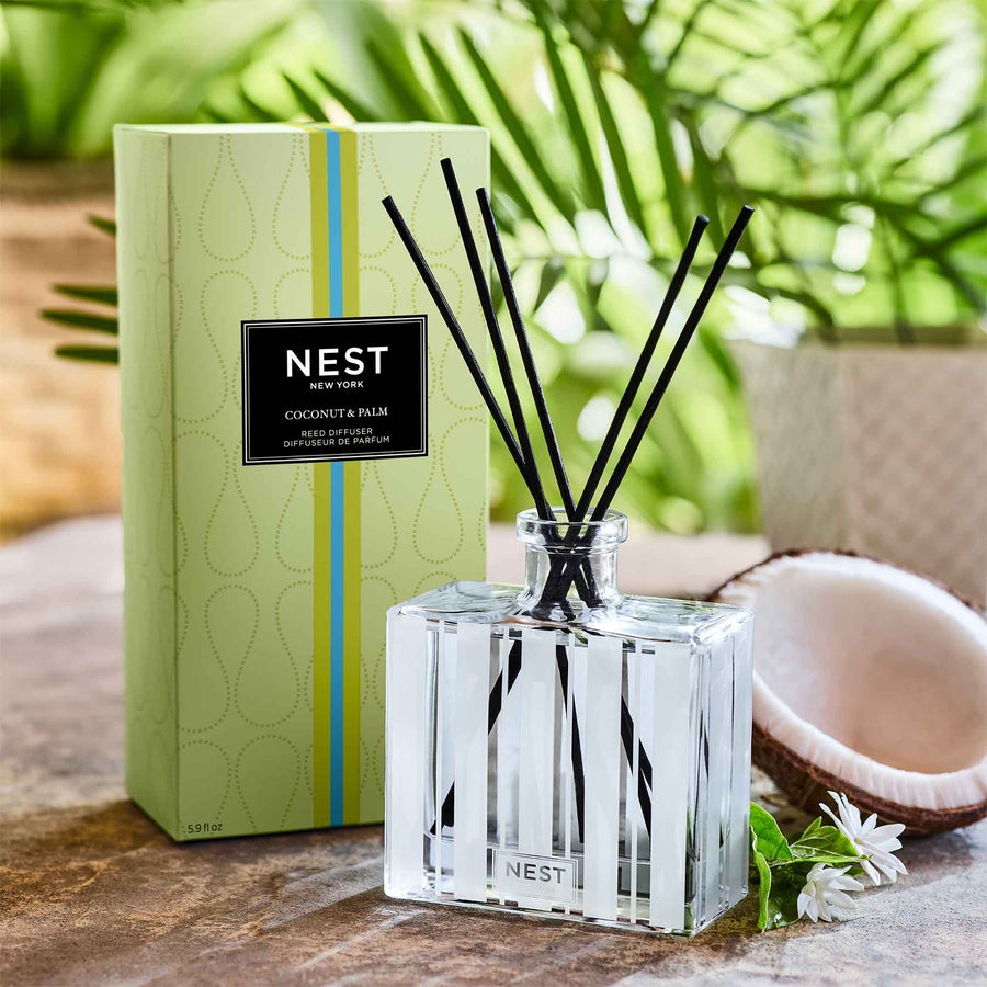 Coconut & Palm Reed Diffuser by NEST New York with coconut and palm leaves