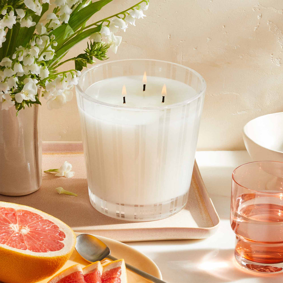 Grapefruit 3-Wick Candle by NEST New York with grapefruit, water, and flowers