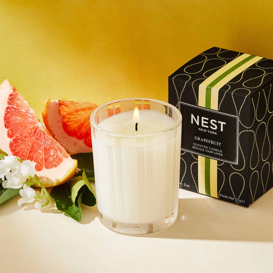 Grapefruit Votive Candle by NEST New York with grapefruit and flowers