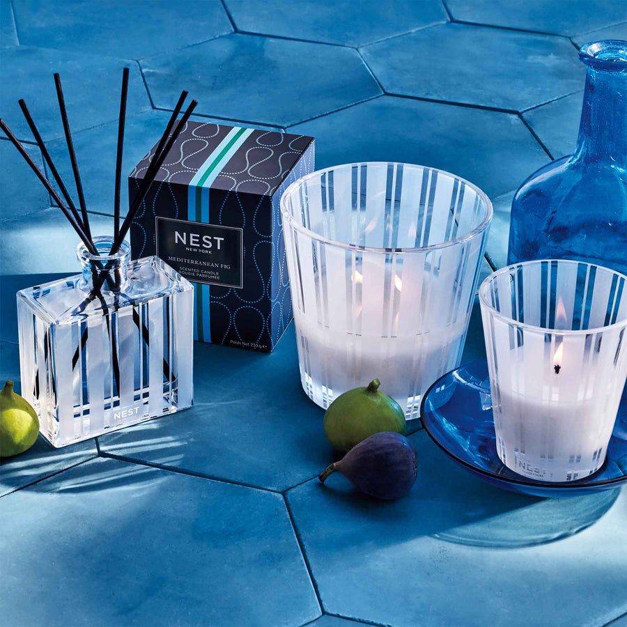 Mediterranean Fig Reed Diffuser, Classic Candle, and 3-Wick Candle by NEST New York with figs and vase