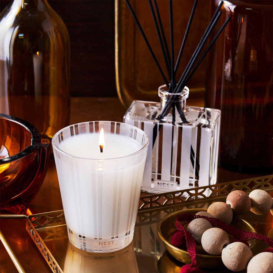 Moroccan Amber Reed Diffuser and Classic Candle by NEST New York with tray