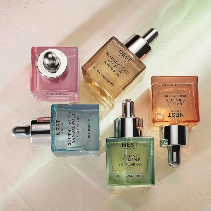 Indian Jasmine, Seville Orange, Madagascar Vanilla, South Pacific Sandalwood, and Turkish Rose Perfume Oils by NEST New York
