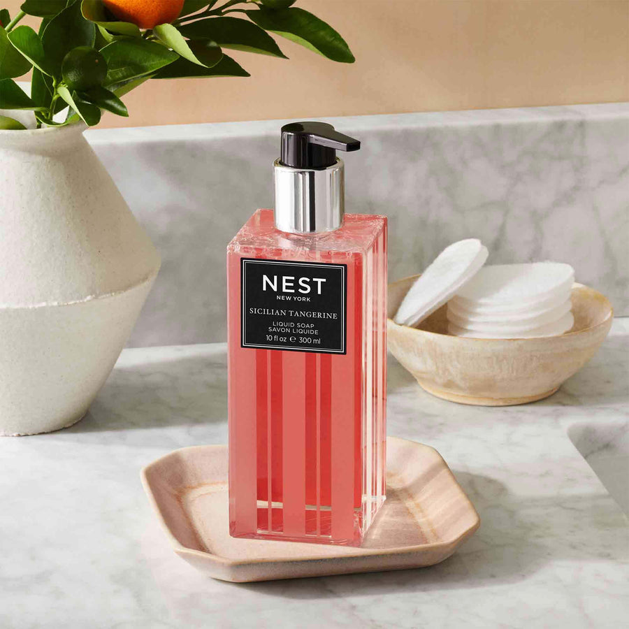 Sicilian Tangerine Liquid Soap by NEST New York with orange and cotton rounds