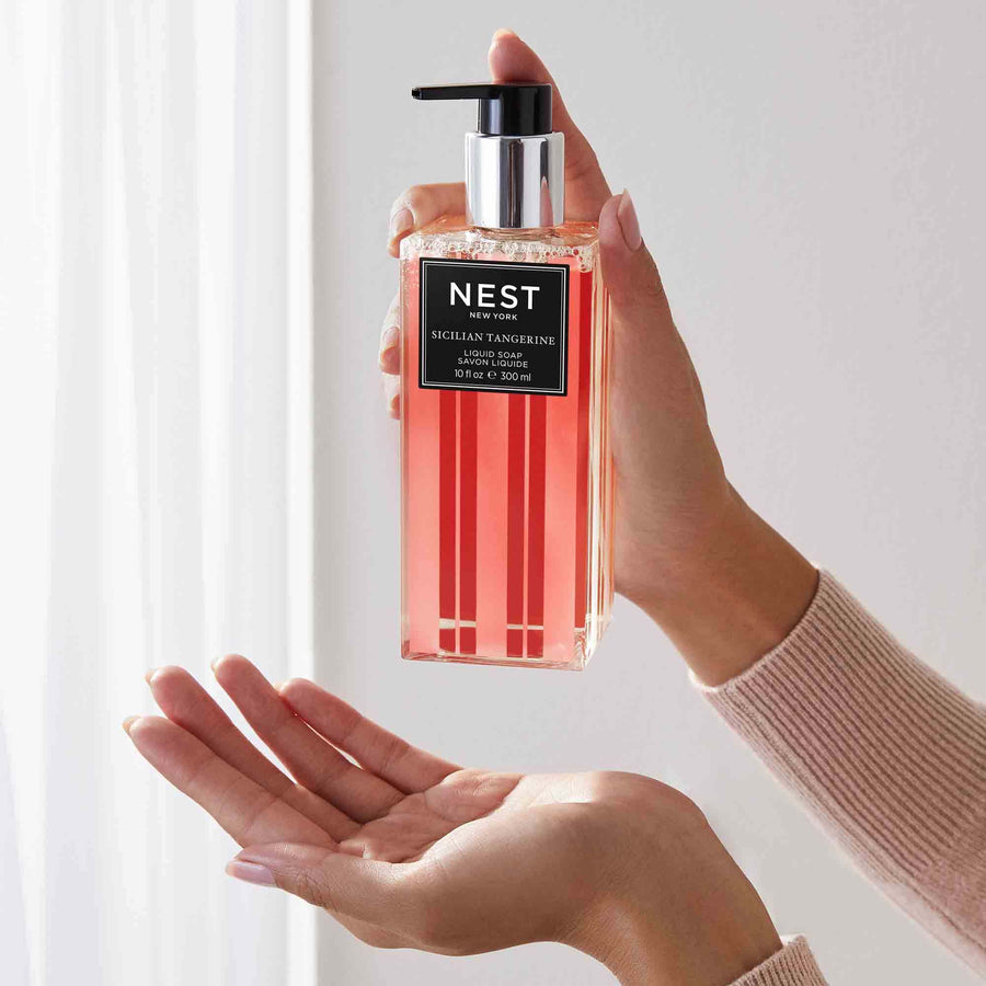 Sicilian Tangerine Liquid Soap by NEST New York with hand model