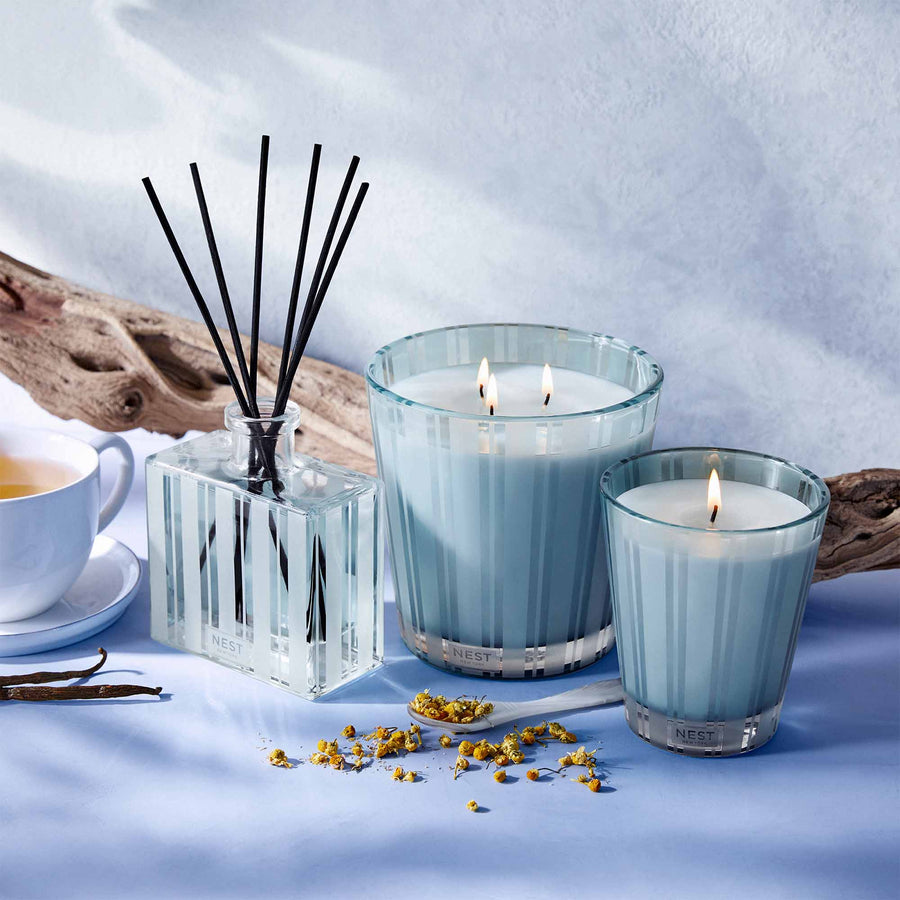 Driftwood & Chamomile Reed Diffuser, Classic Candle, and 3-Wick Candle by NEST New York with driftwood and tea