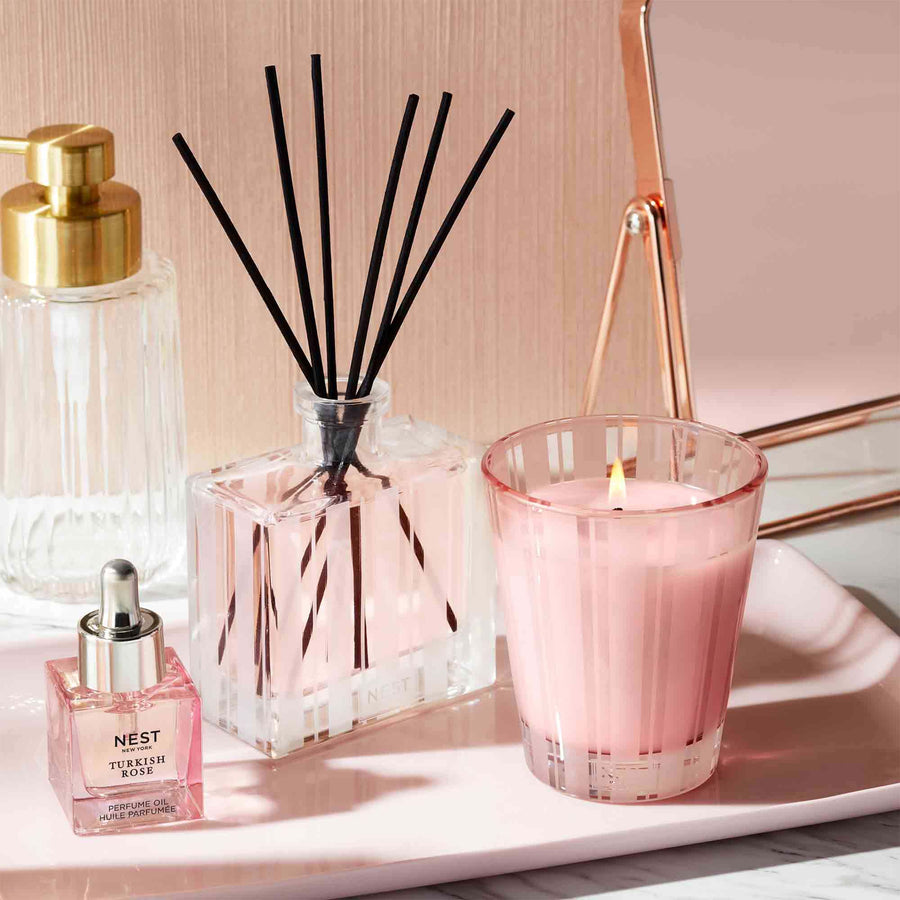Himalayan Salt & Rosewater Classic Candle, Reed Diffuser, and Turkish Rose Perfume Oil by NEST New York with mirror