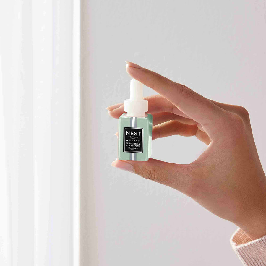 Wild Mint & Eucalyptus Refill for Pura by NEST New York with hand model